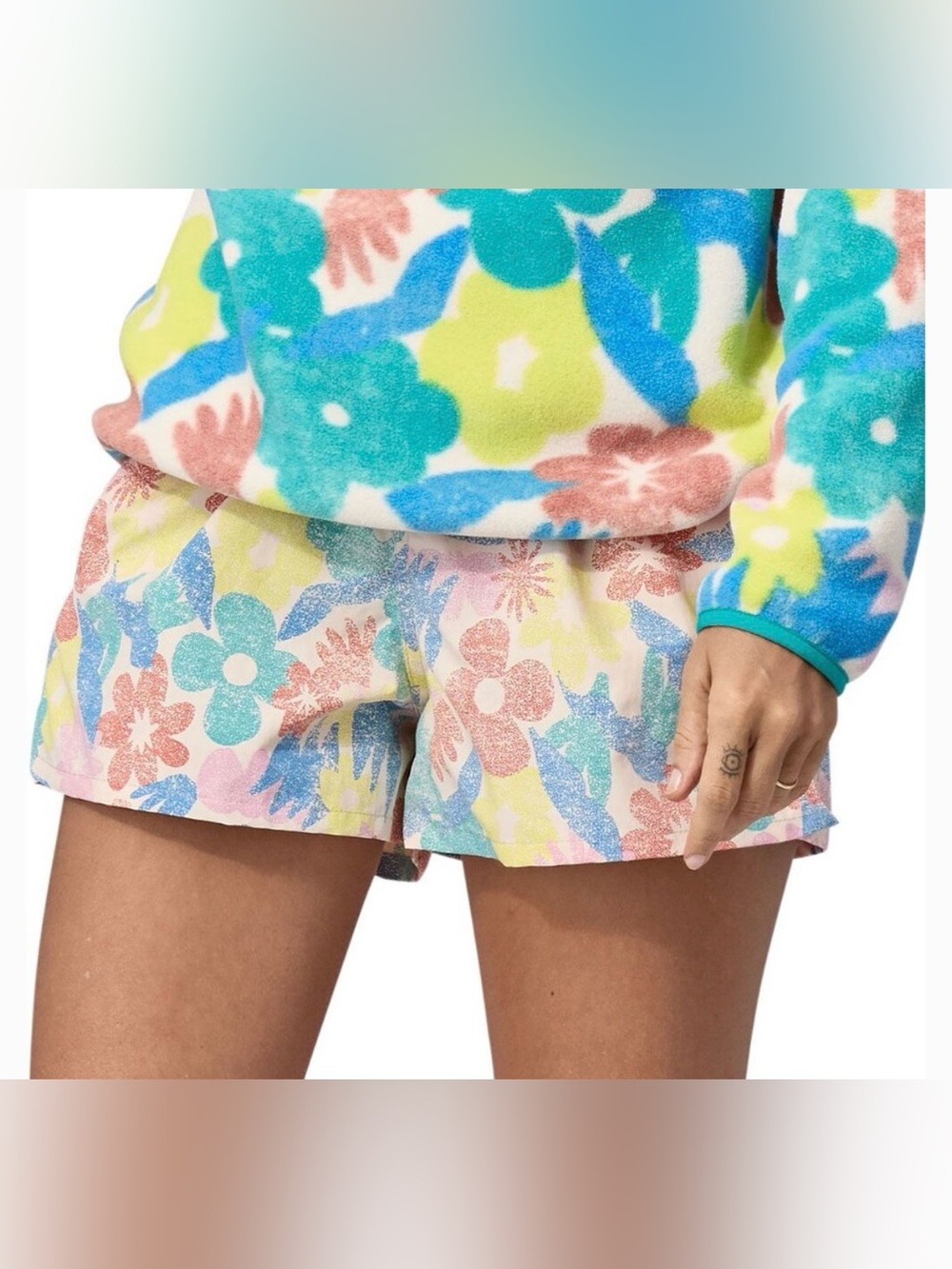 Patagona Floral Barely Baggies, size large. NWOT. Sporty and hip